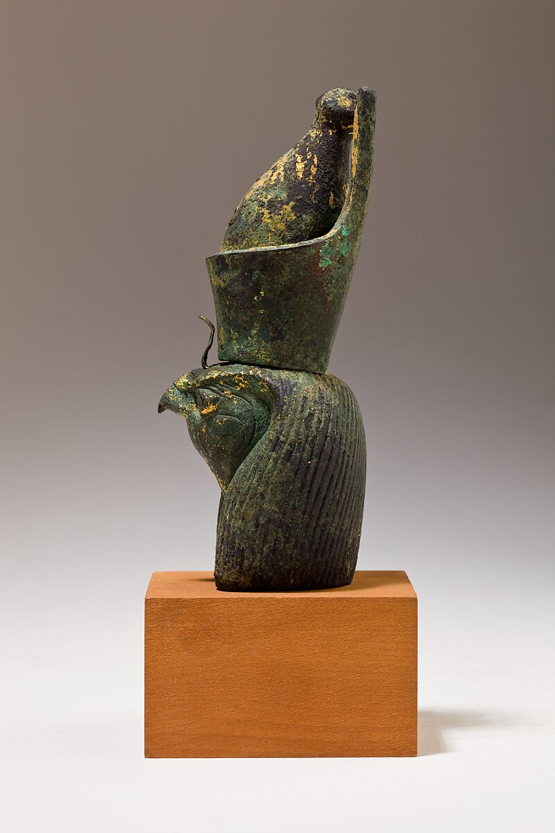 Head of Horus for attachment, Cupreous metal, precious metal leaf