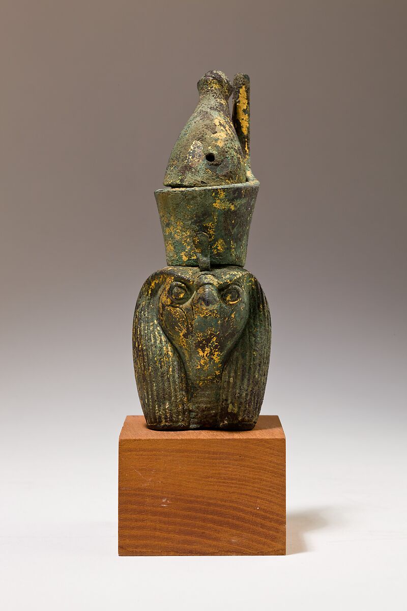 Head of Horus for attachment, Cupreous metal, precious metal leaf