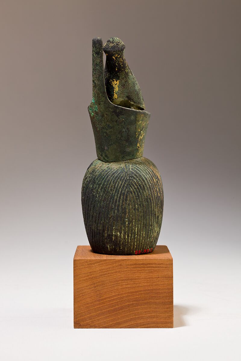 Head of Horus for attachment, Cupreous metal, precious metal leaf