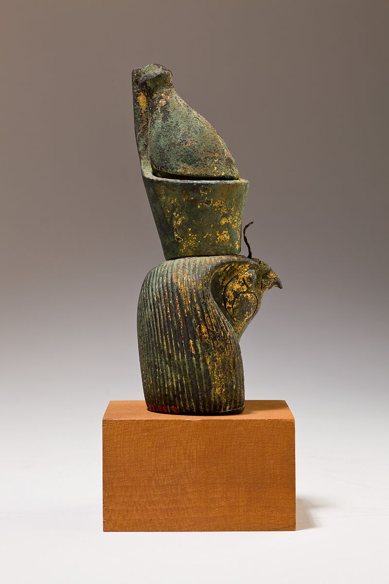 Head of Horus for attachment, Cupreous metal, precious metal leaf