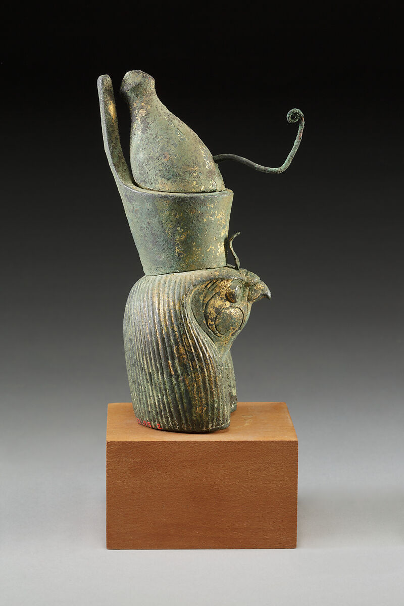 Head of Horus for attachment, Cupreous metal, precious metal leaf