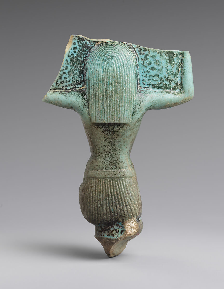 Figurine of a kneeling god, probably Shu, faience