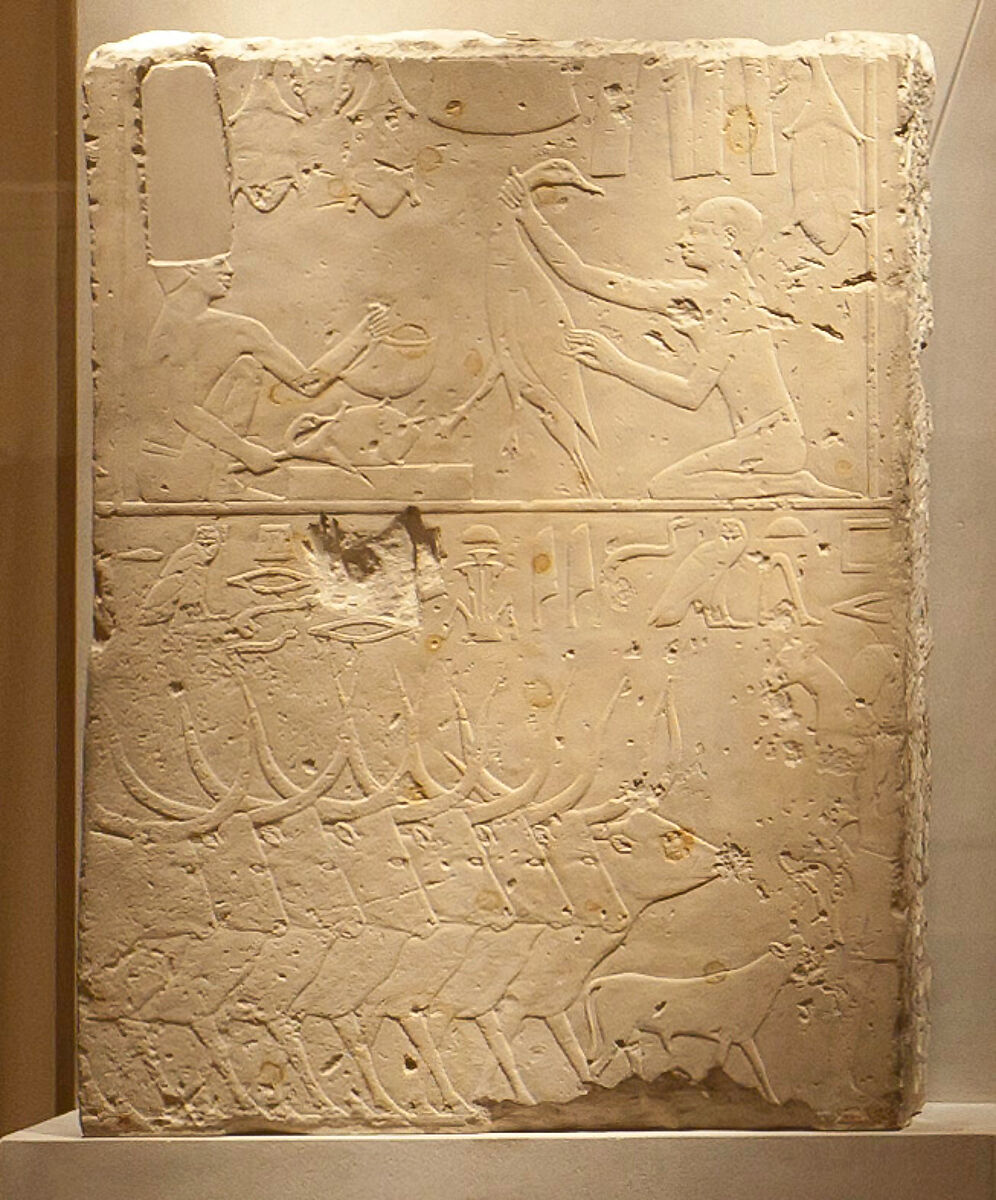 Relief block depicting plucking and roasting fowl and herds crossing water, Limestone