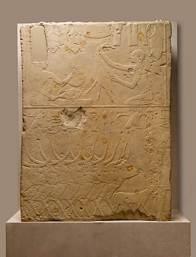 Relief block depicting plucking and roasting fowl and herds crossing water