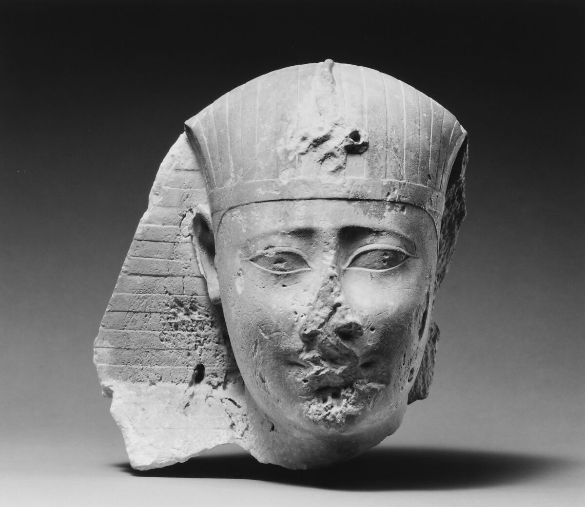 Head of an early Ptolemy, possibly from a sphinx, Limestone 