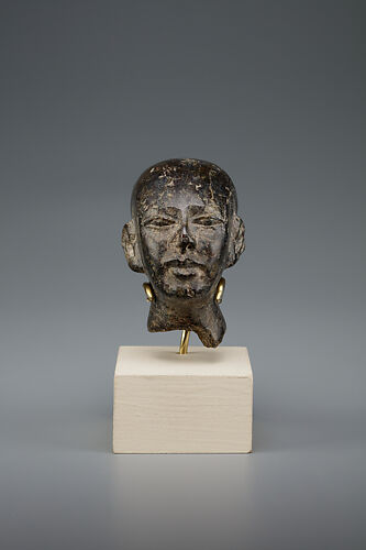 Head of male statue