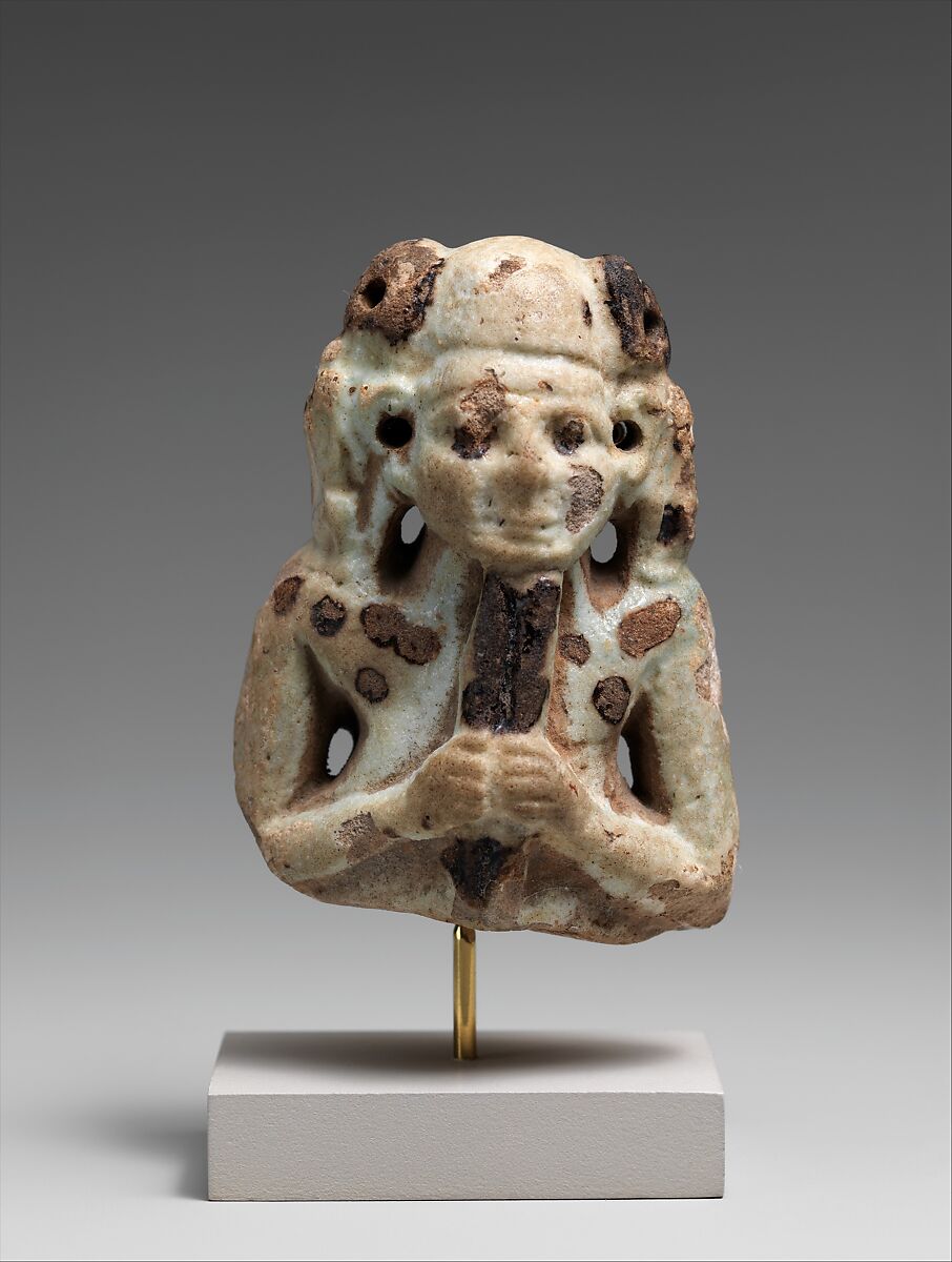 Double-flute player, Faience 