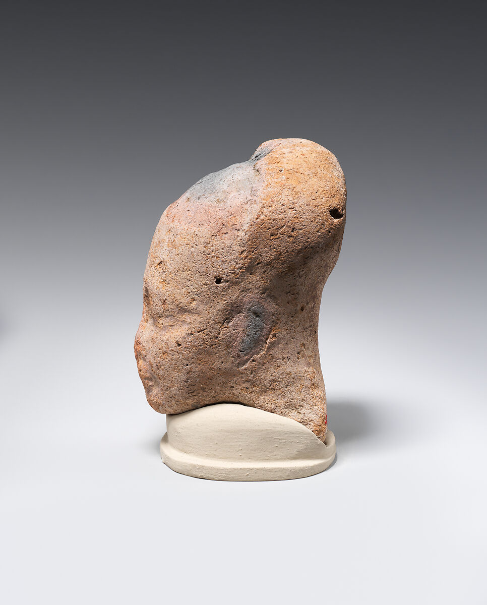 Head of female figure, Pottery