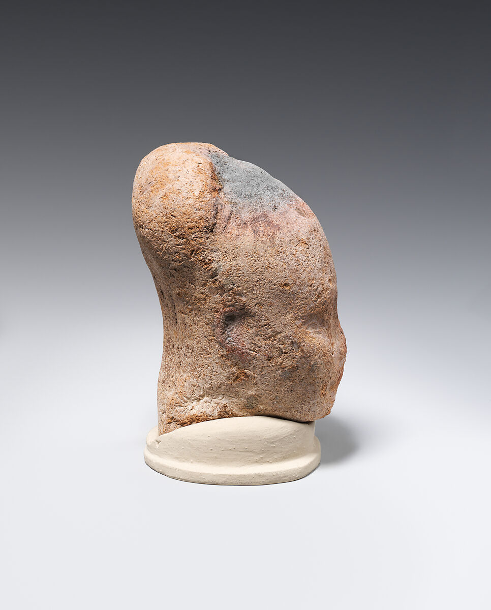 Head of female figure, Pottery
