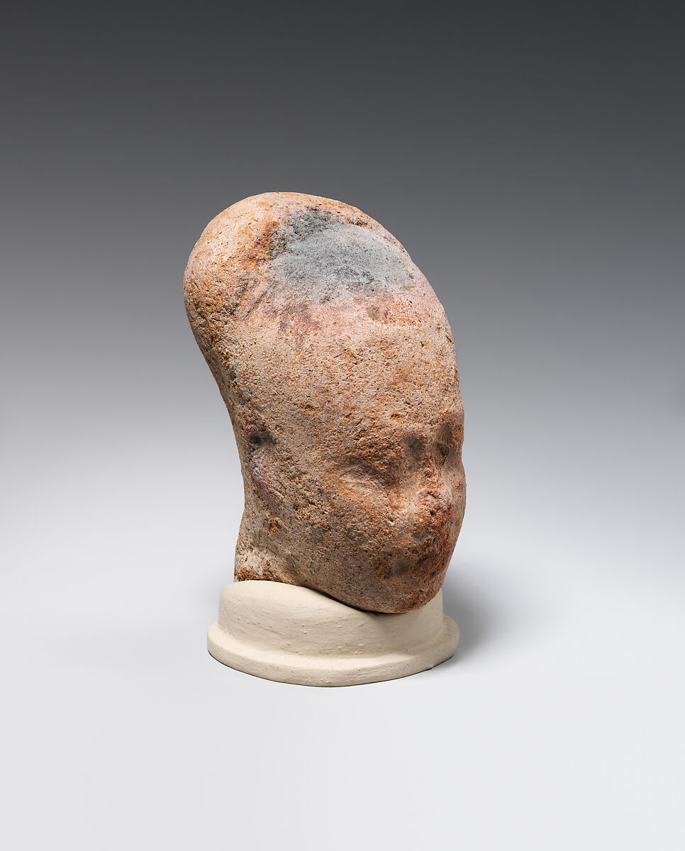 Head of female figure, Pottery