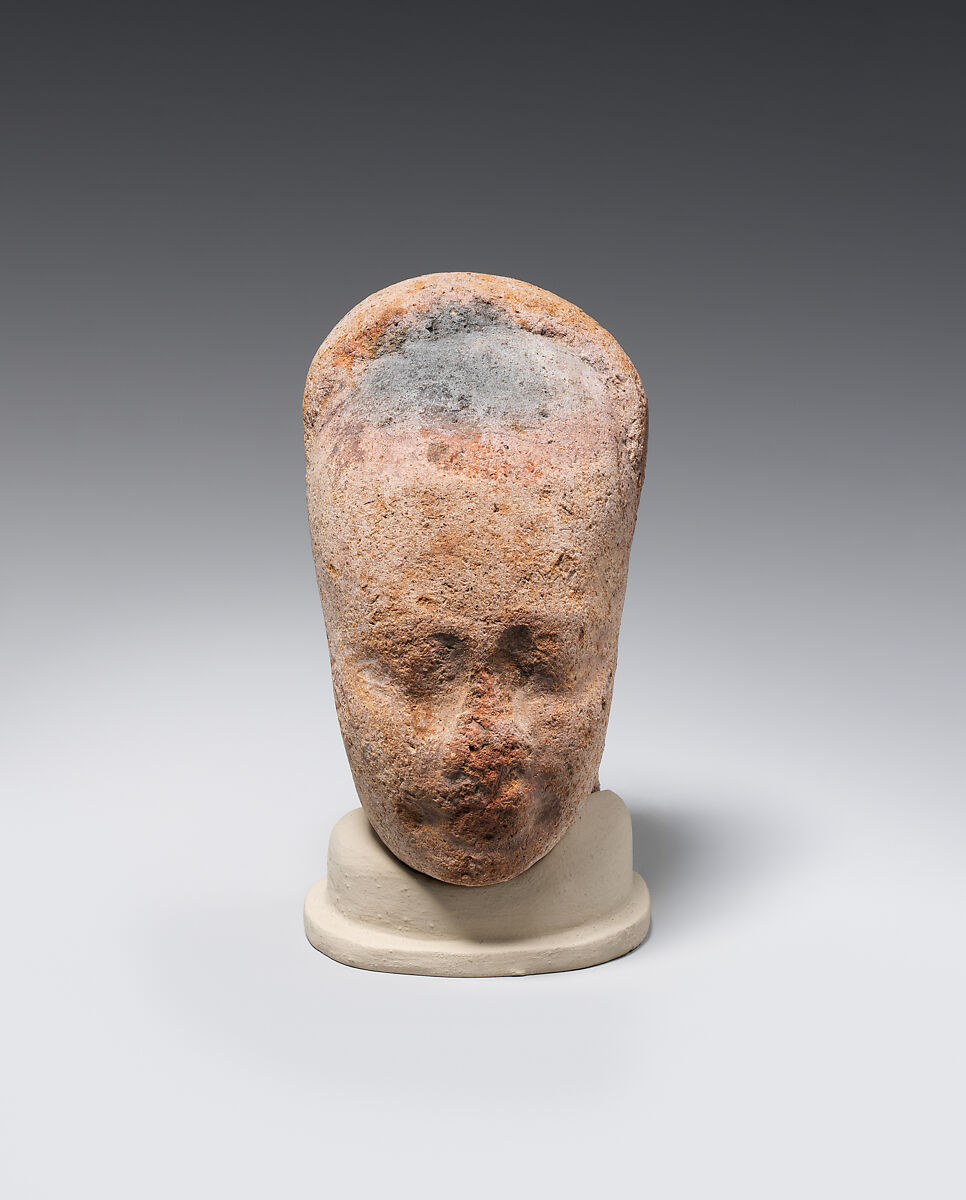 Head of female figure, Pottery 