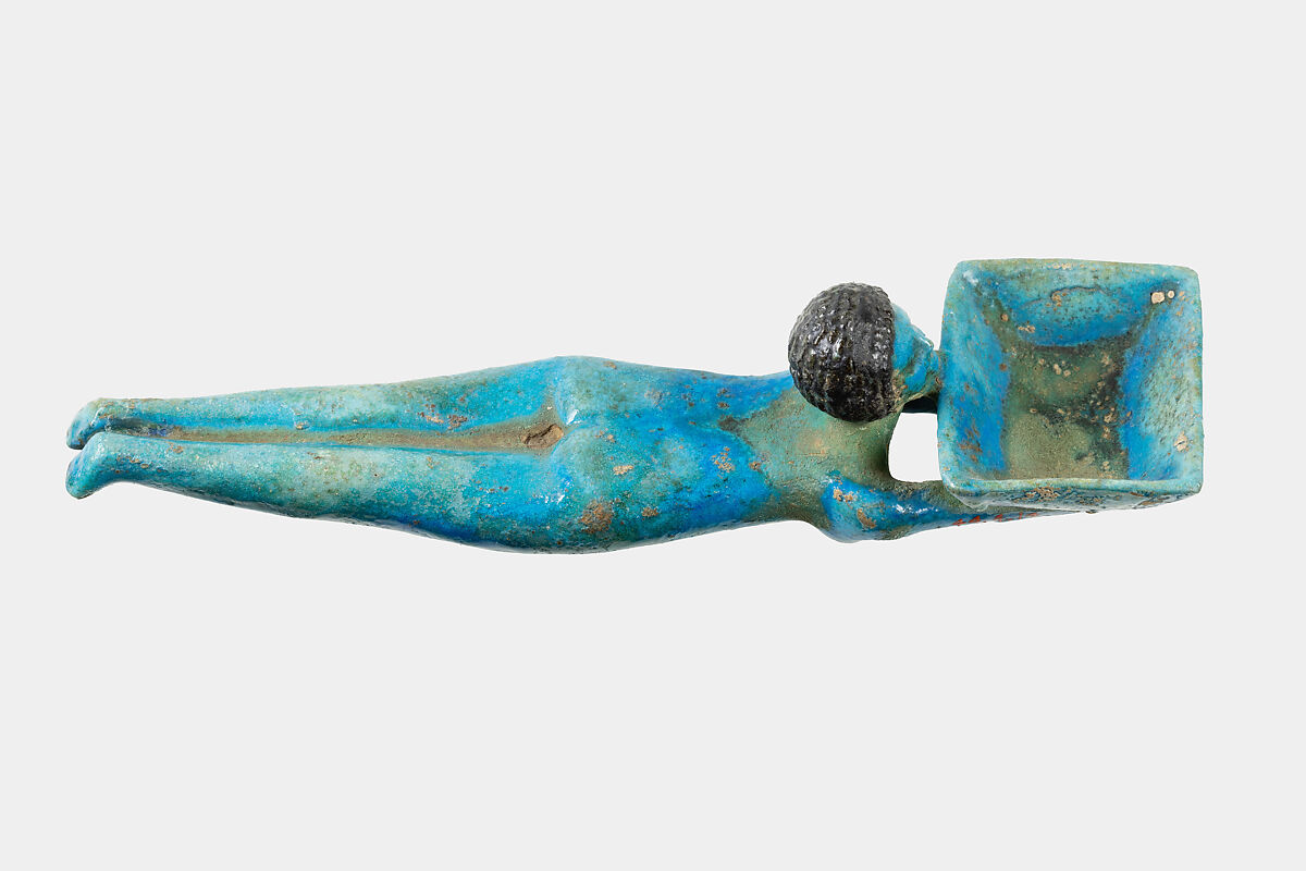 Cosmetic Spoon in the Form of a Swimming Girl, Faience