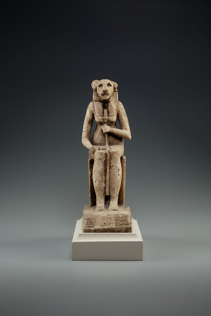 Bastet on a throne decorated with the decans, Faience