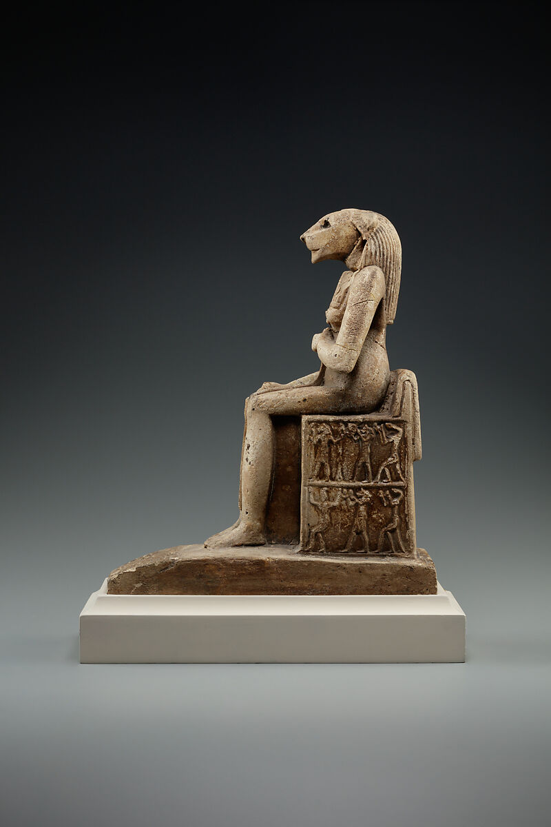 Bastet on a throne decorated with the decans, Faience