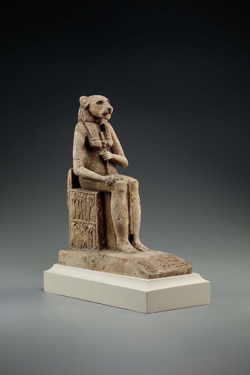 Bastet on a throne decorated with the decans, Faience