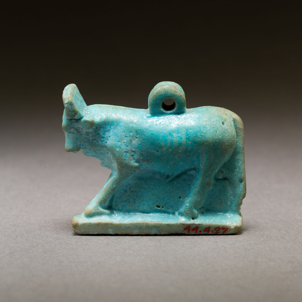 Bull amulet, Pale blue faience