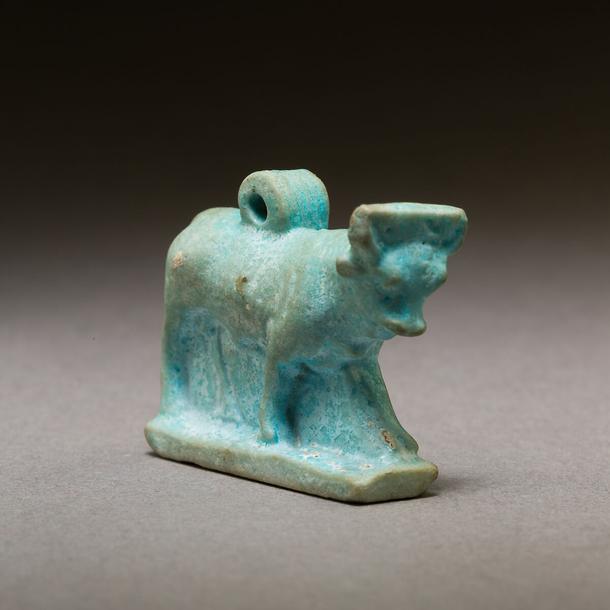 Bull amulet, Pale blue faience
