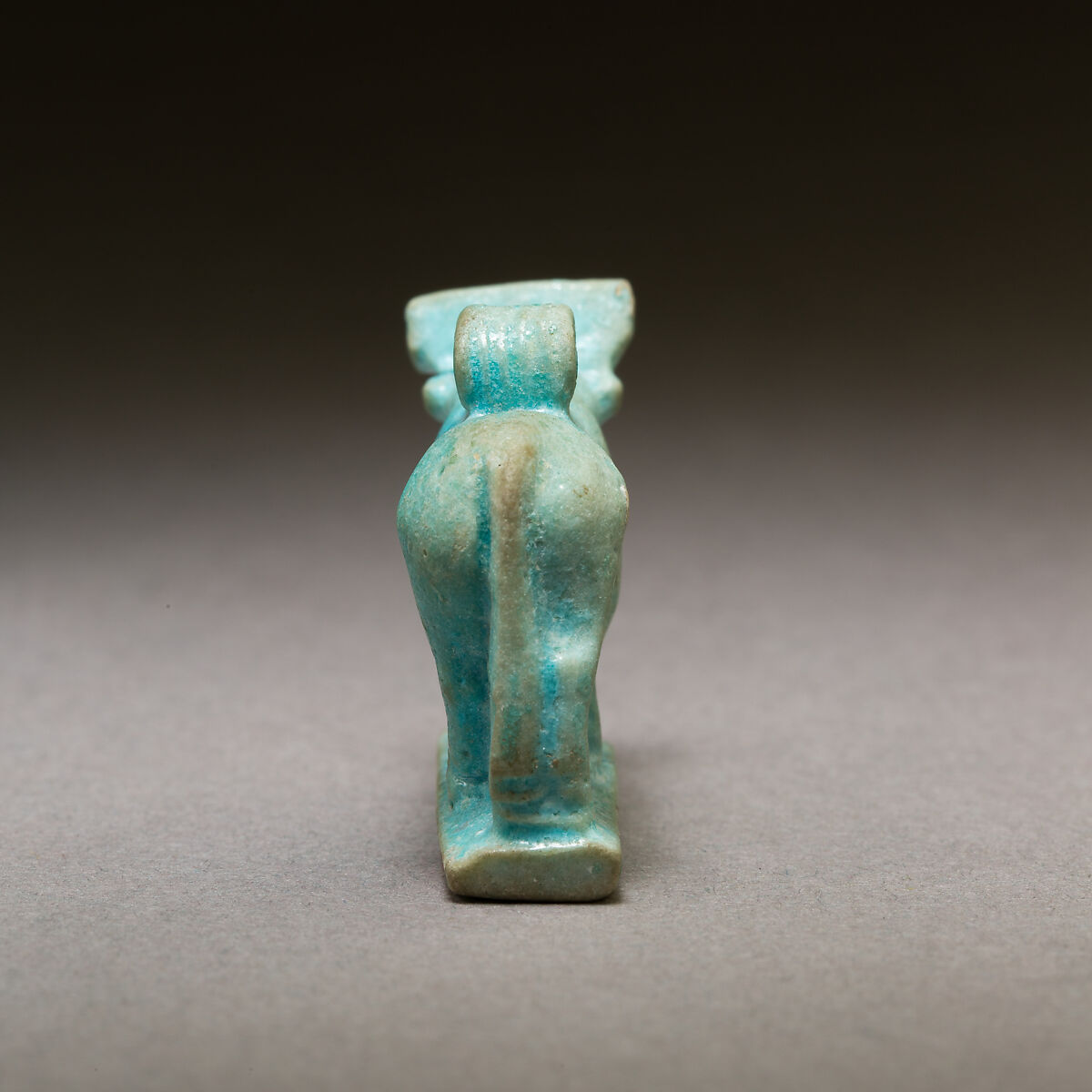 Bull amulet, Pale blue faience