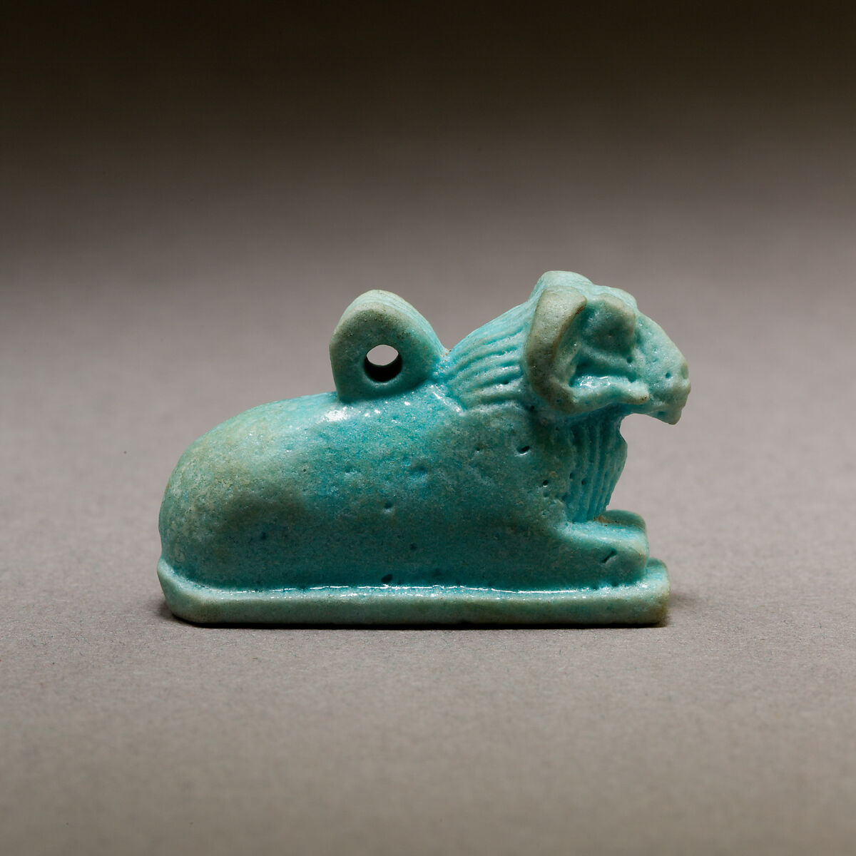 Ram amulet, Pale blue faience