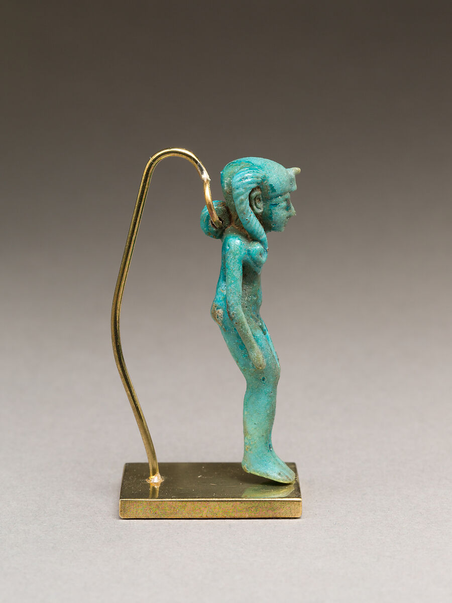 Child god (Harpokrates?) amulet, Faience