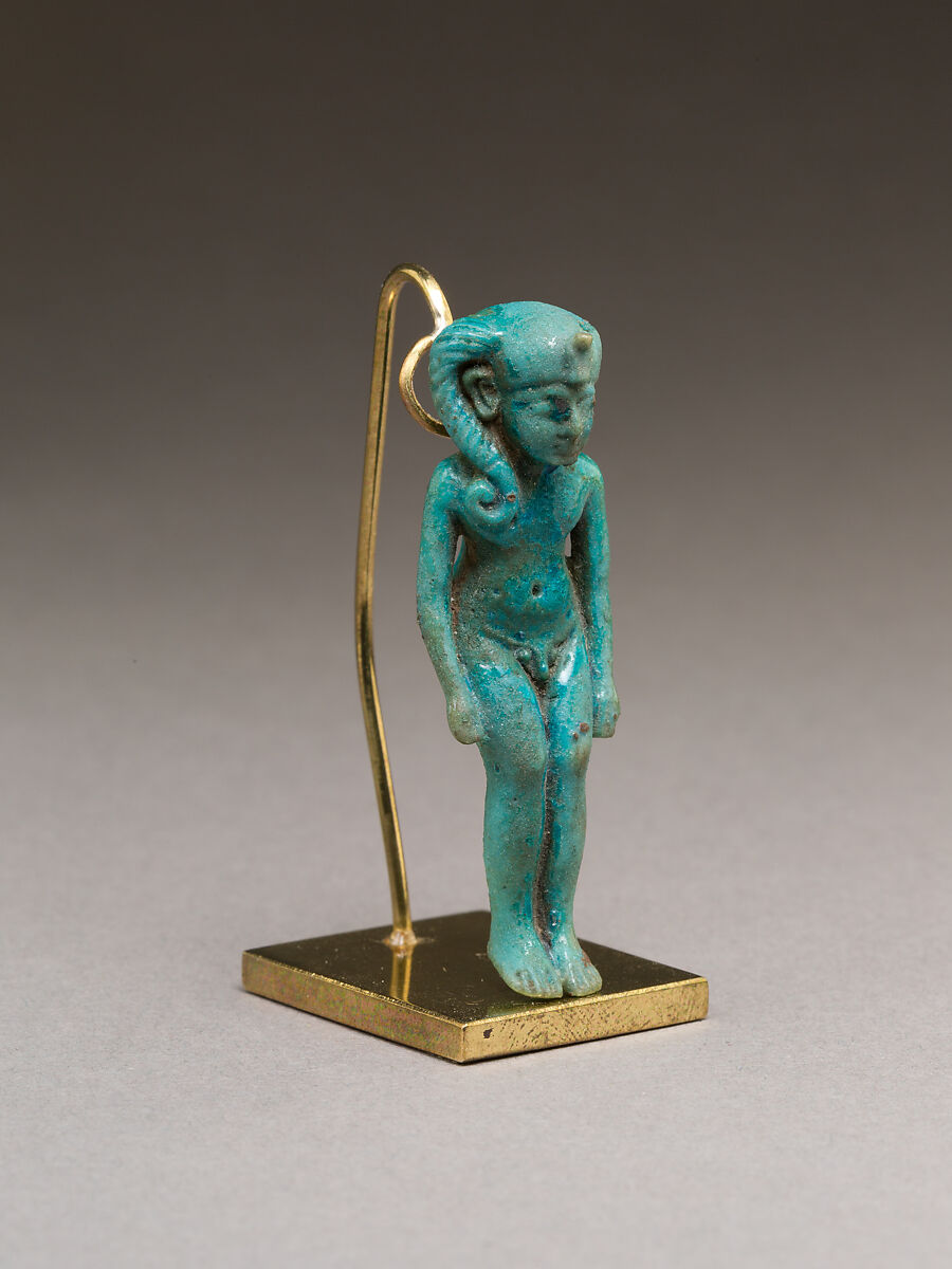 Child god (Harpokrates?) amulet, Faience 