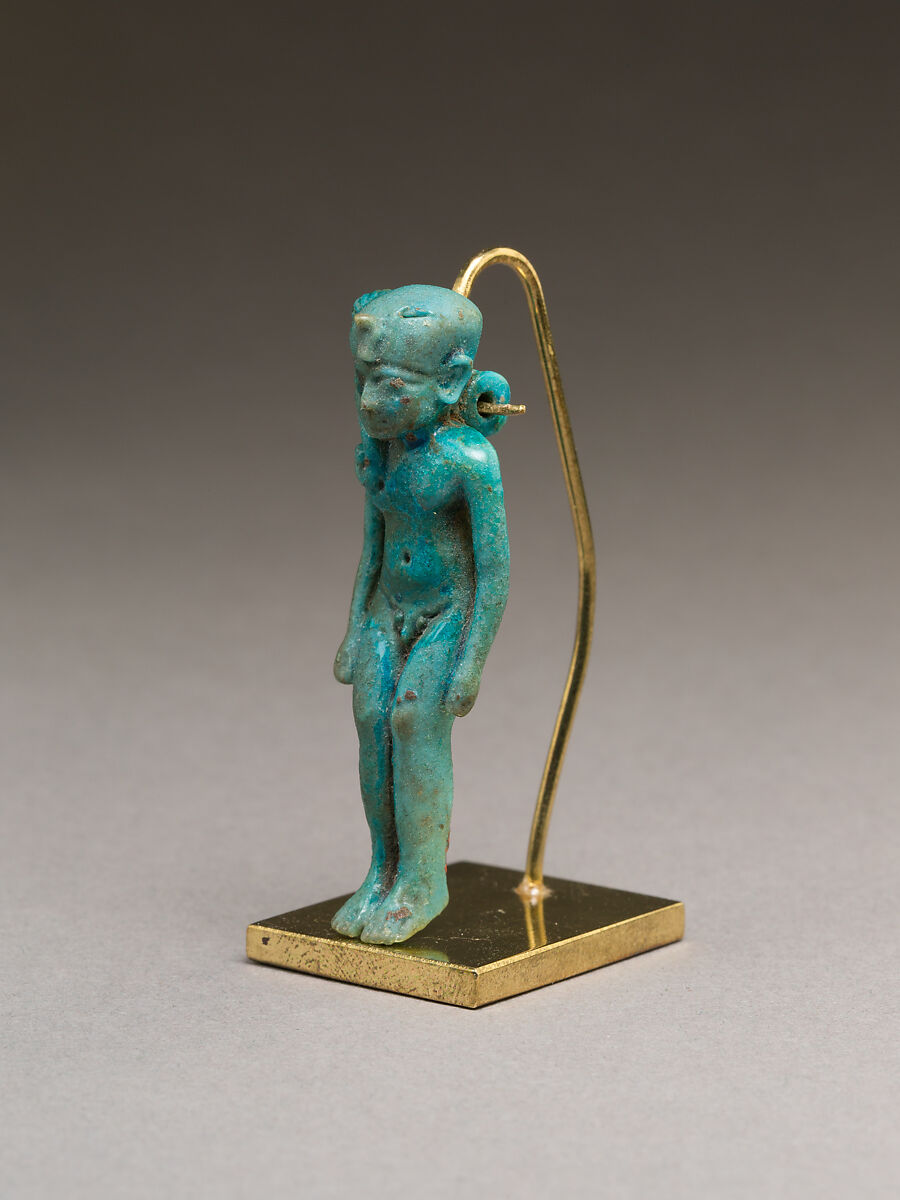 Child god (Harpokrates?) amulet, Faience