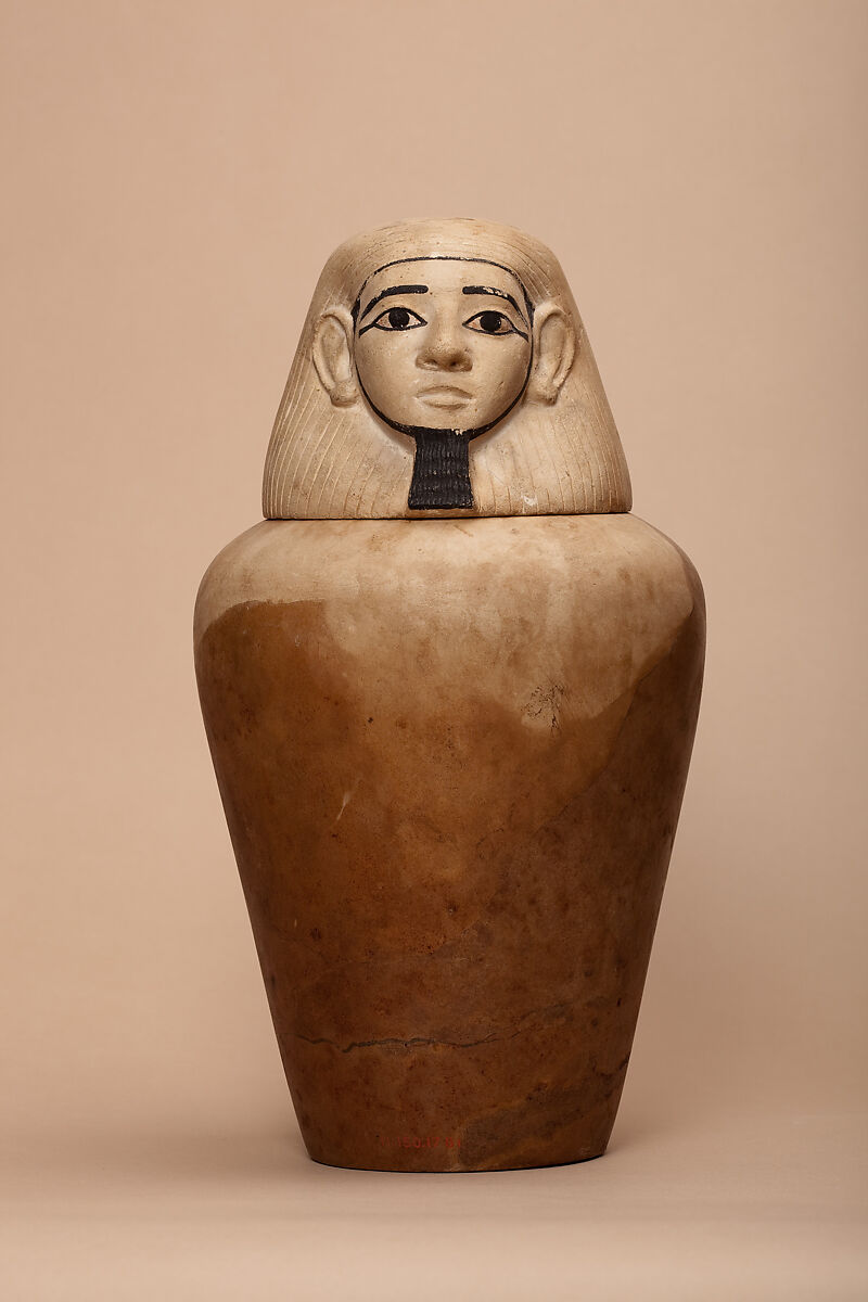 Canopic jar of Nephthys, Indurated limestone, paint, linen 