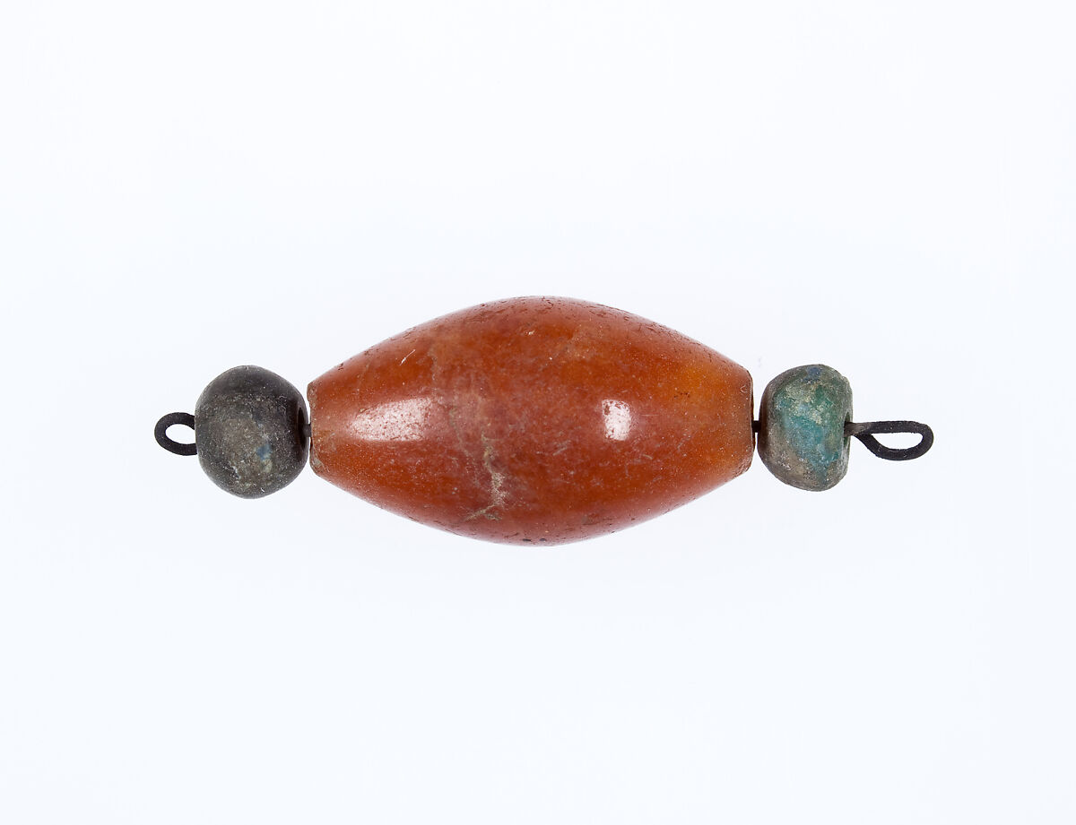 Bead ornament of Hapiankhtifi, Carnelian, faience, cupreous metal 