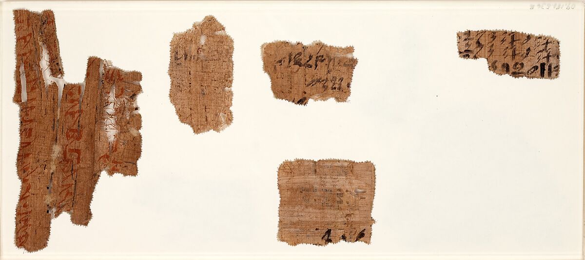 Three frames with papyrus fragments, Papyrus, ink