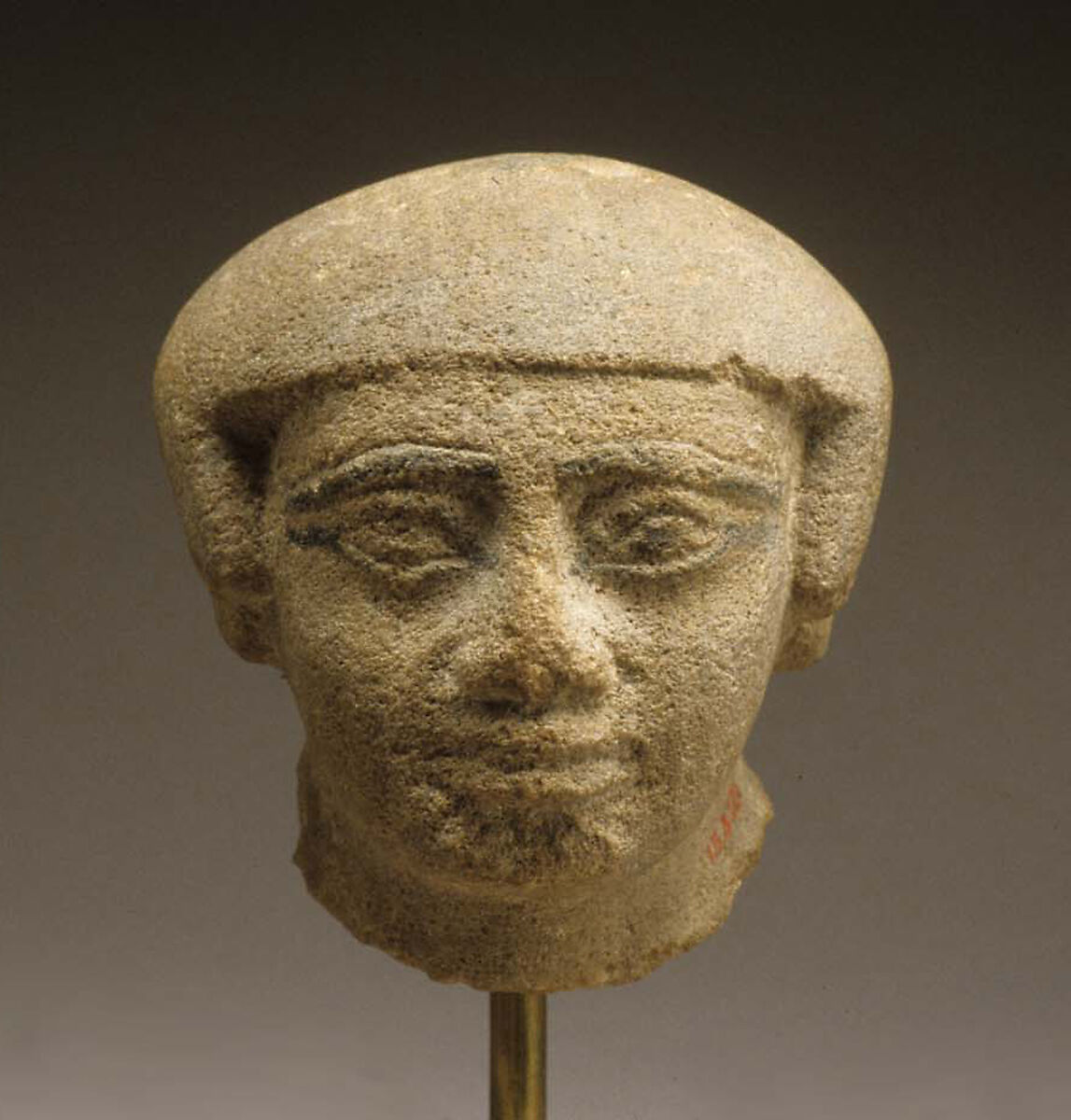 Head of a male statue, Sandstone, paint 