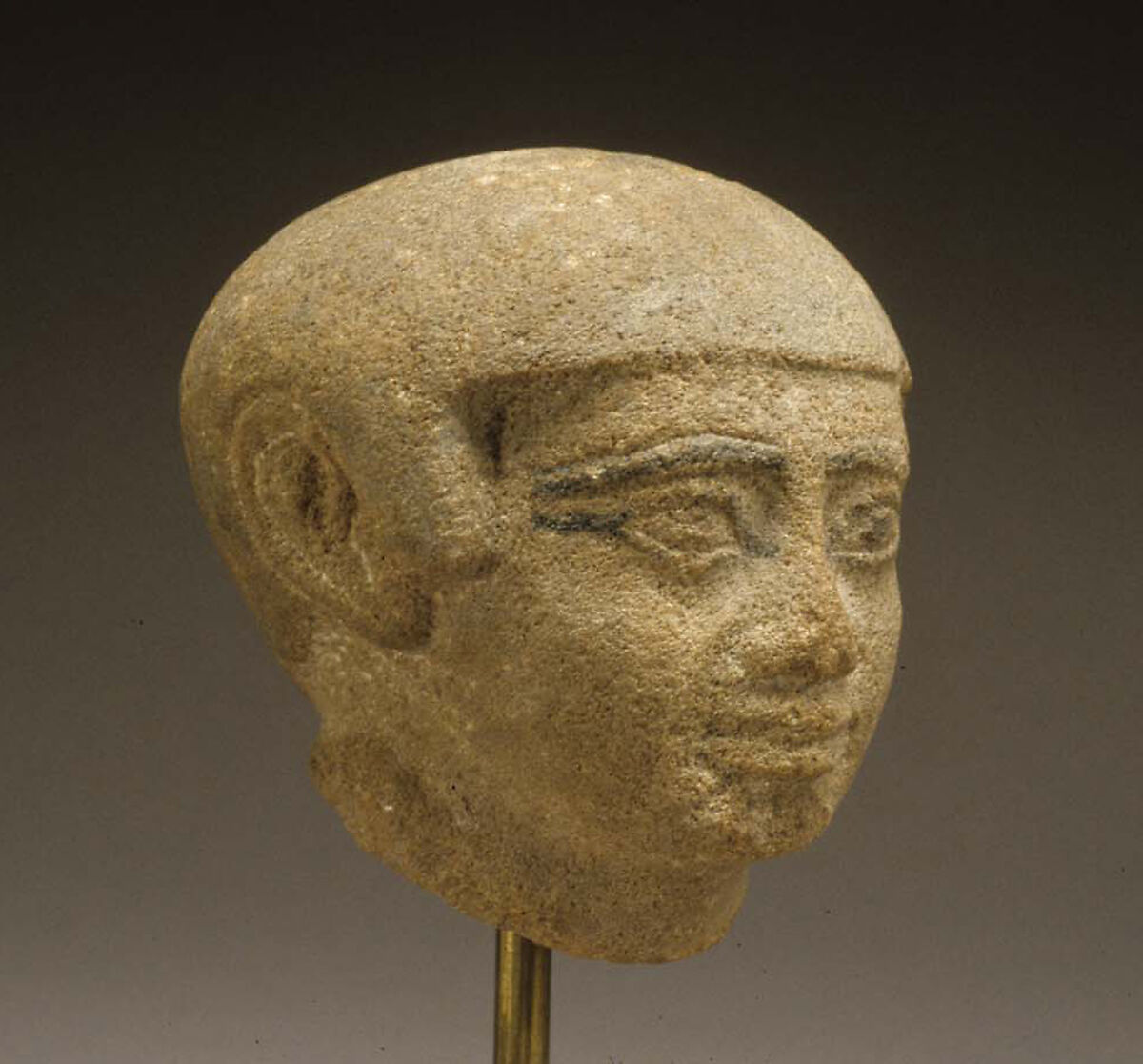 Head of a male statue, Sandstone, paint
