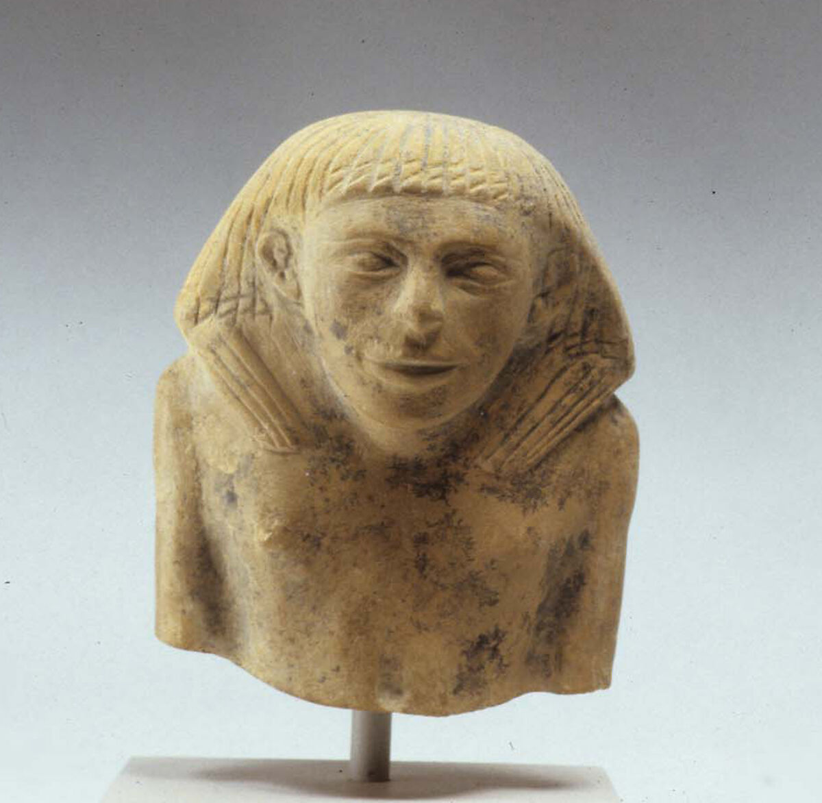 Upper part of male statue, Limestone 