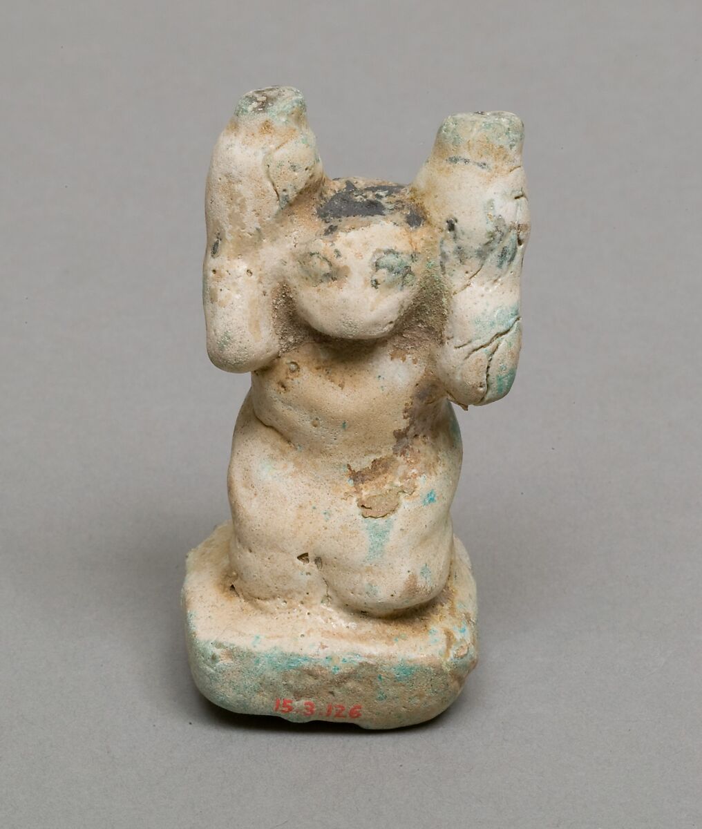 Figure of Servant carrying jars, Blue faience 