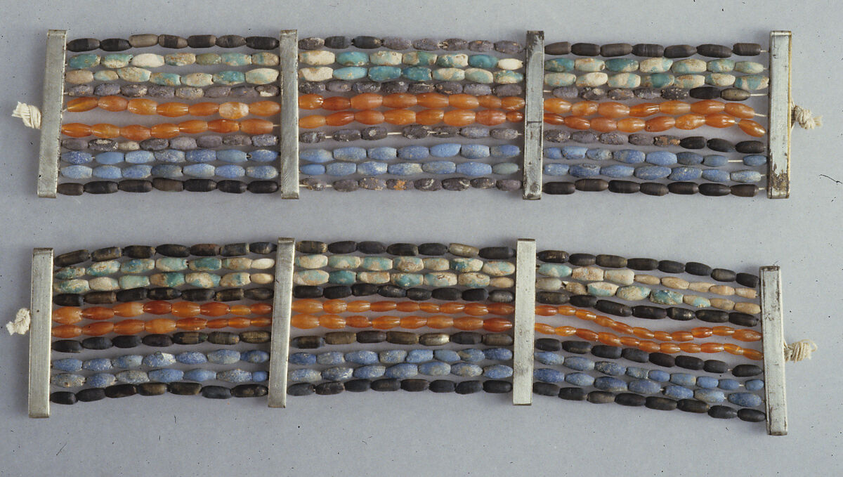 Pair of bracelets, Silver, green faience, blue paste, carnelian