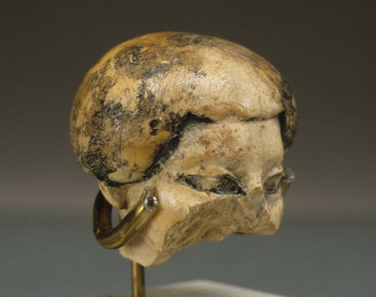 Head of statuette, Ivory, paint