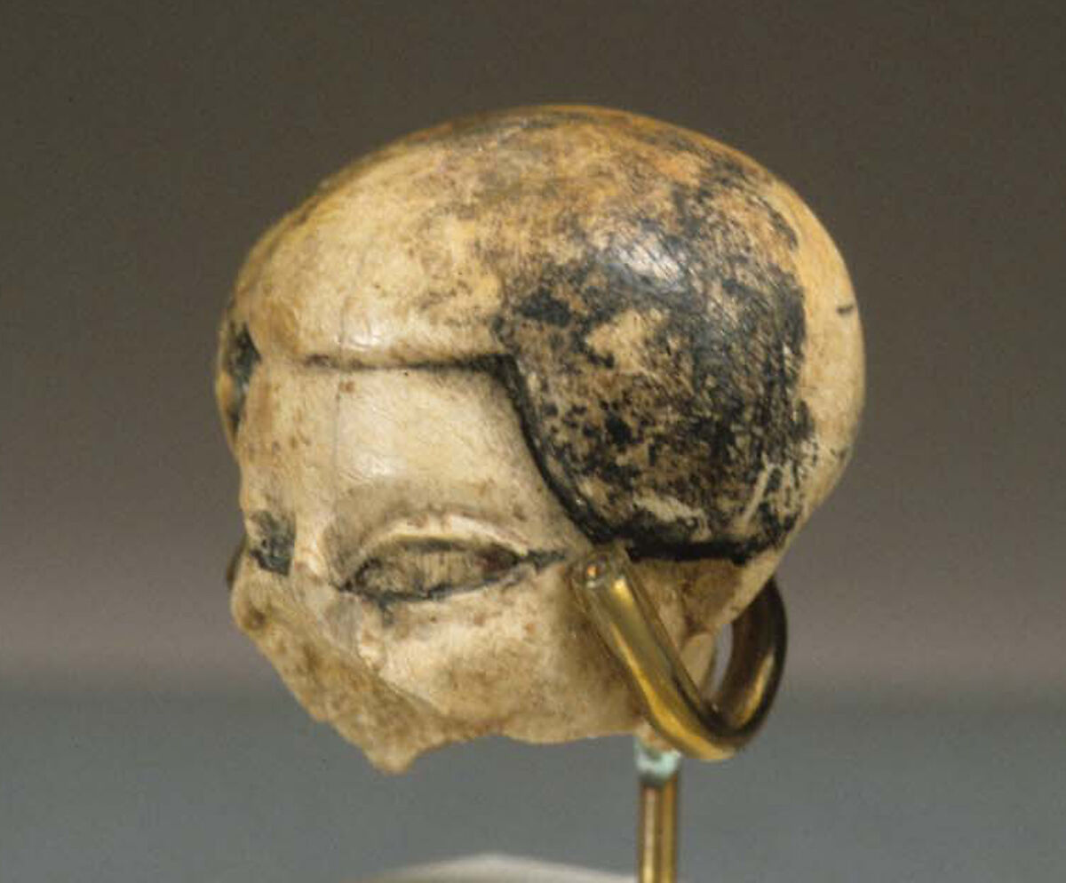 Head of statuette, Ivory, paint