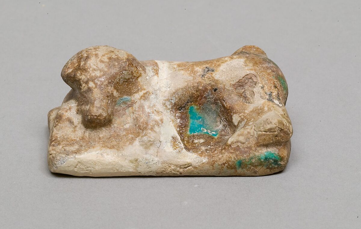 Dog, Faience, traces of blue glaze 