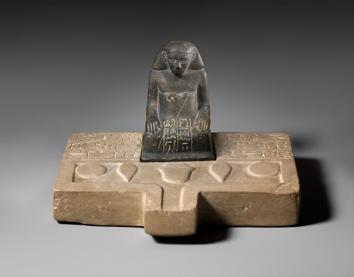 Offering table with statuette of Sehetepib, Limestone table; greywacke statuette 