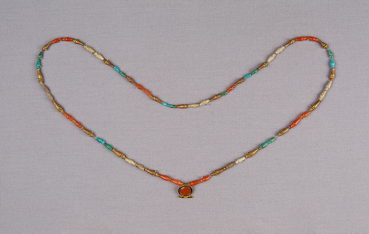 Necklace with Shen-Amulet of Senebtisi, Gold, carnelian, turquoise, faience (some restored) 