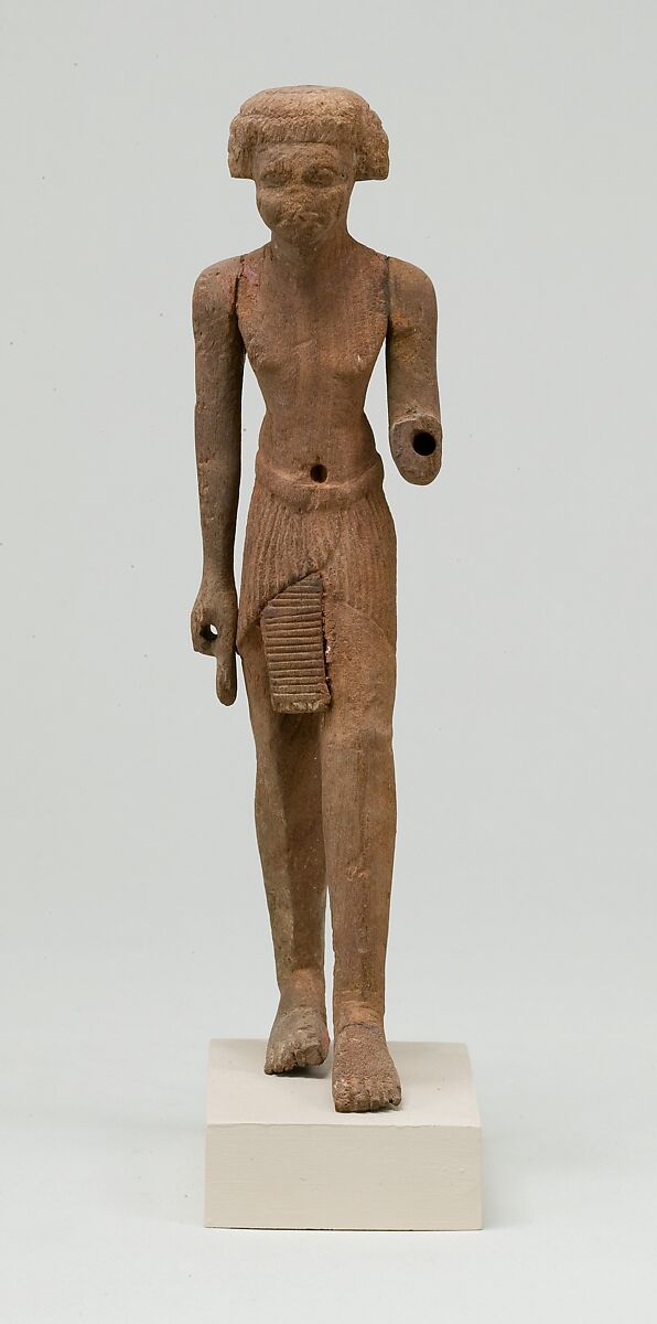 Statuette, striding man, Wood 