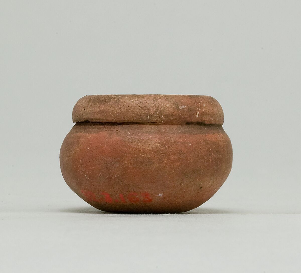 Kohl jar, Pottery: reddish-brown ware 