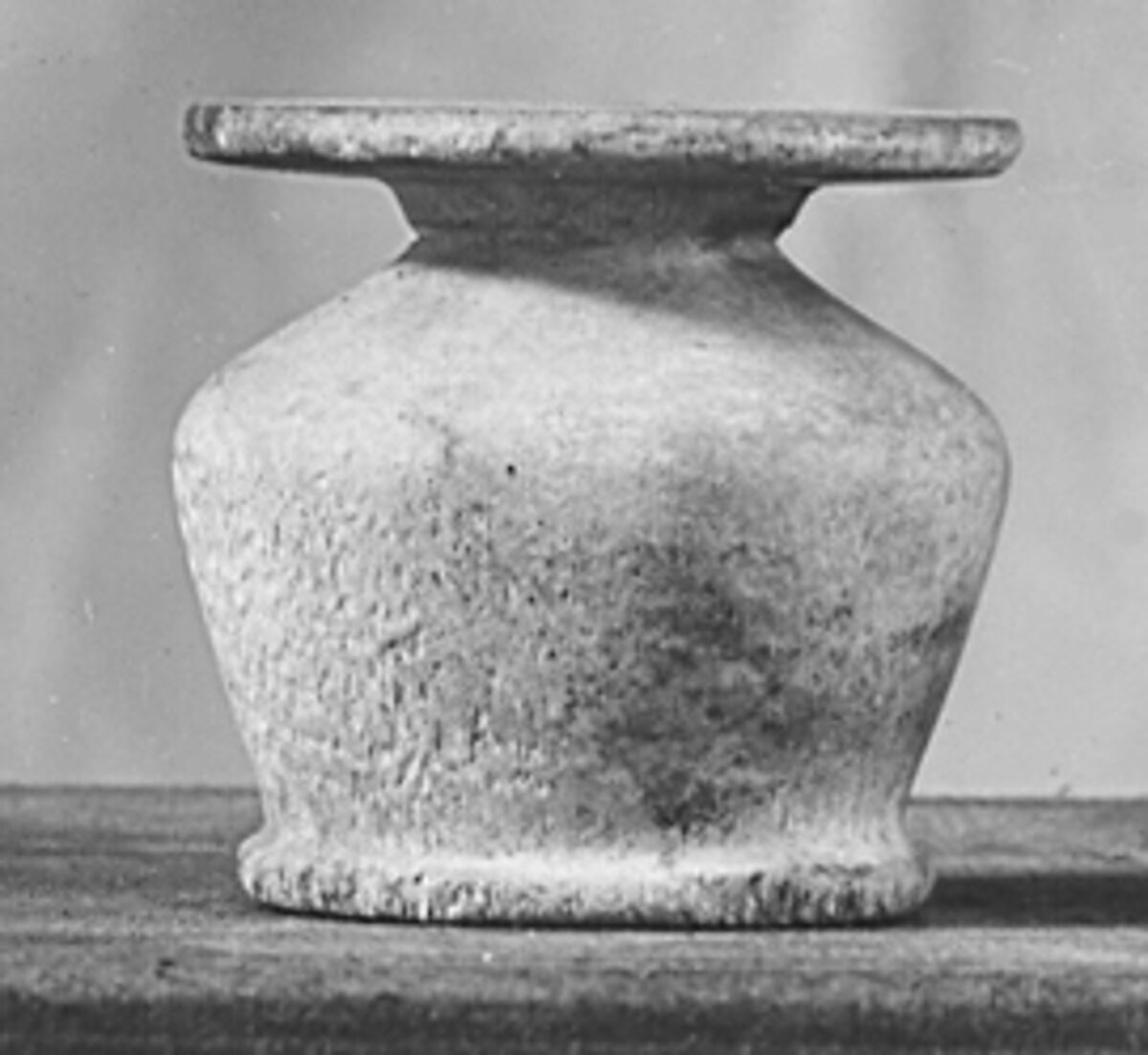 Kohl Jar and Stick, Travertine (Egyptian alabaster); Hematite