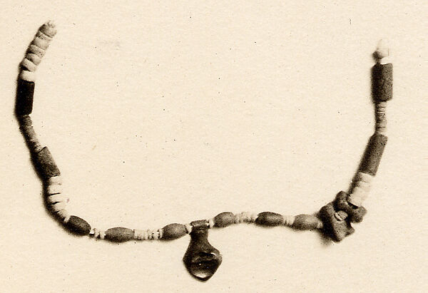 Necklace of beads and amulets