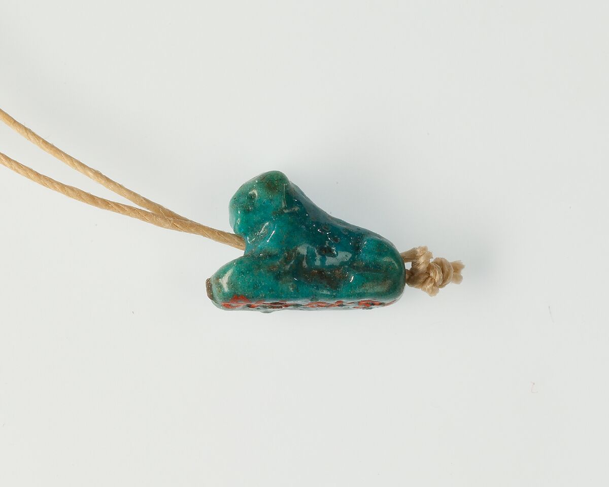 Lion amulet, Faience