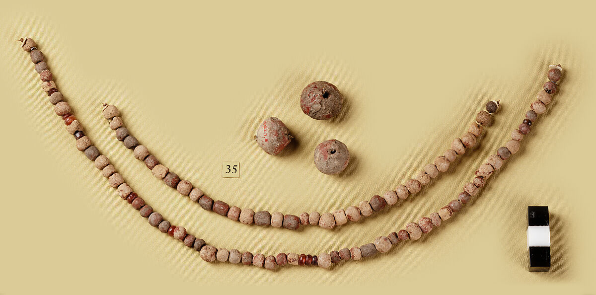 String of beads, Clay (unfired), Carnelian