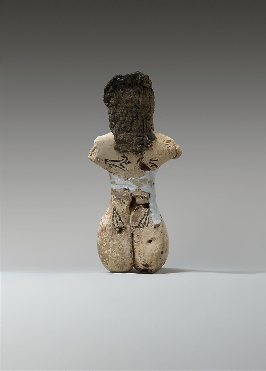 Figurine of a Seated Woman, Limestone, organic material, paint, malachite