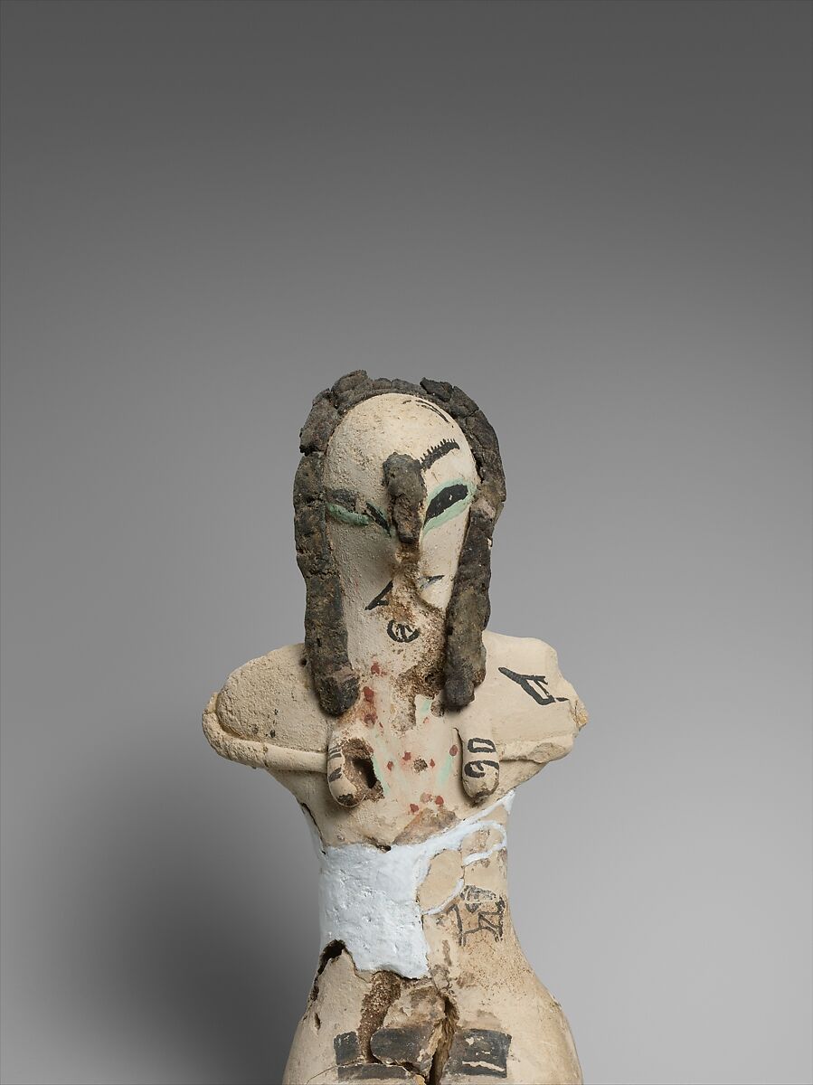 Figurine of a Seated Woman, Limestone, organic material, paint, malachite