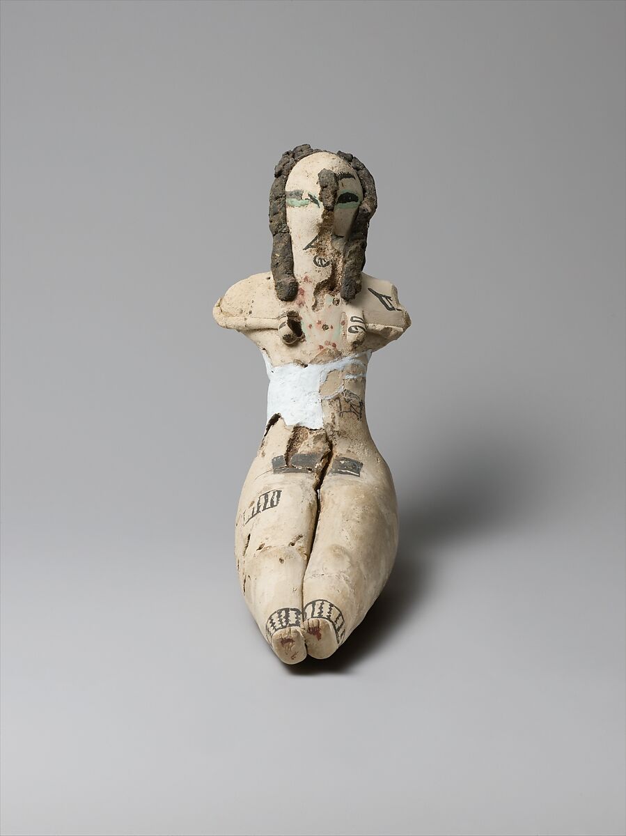 Figurine of a Seated Woman, Limestone, organic material, paint, malachite