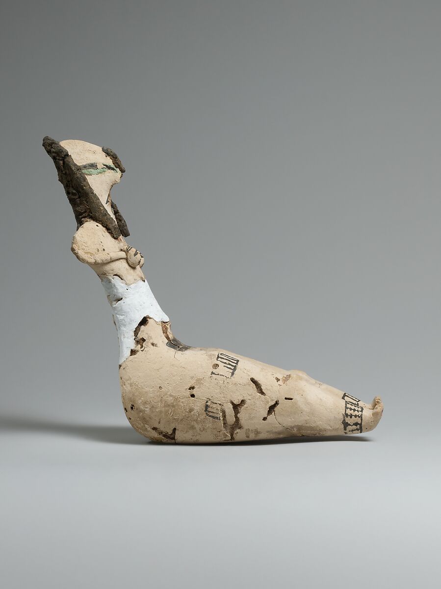 Figurine of a Seated Woman, Limestone, organic material, paint, malachite