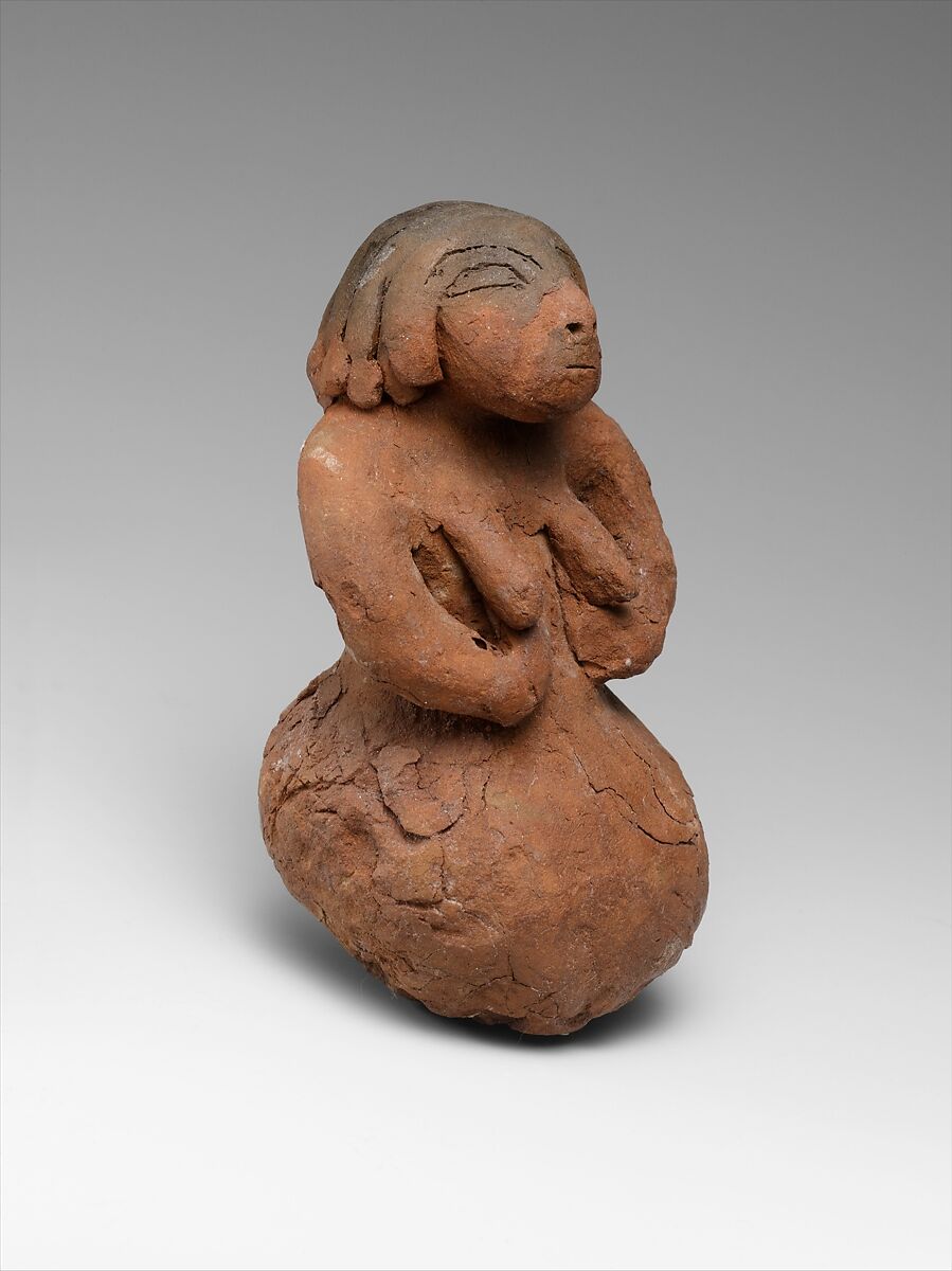 Figurine of a Seated Woman, Pottery (Nile clay) 